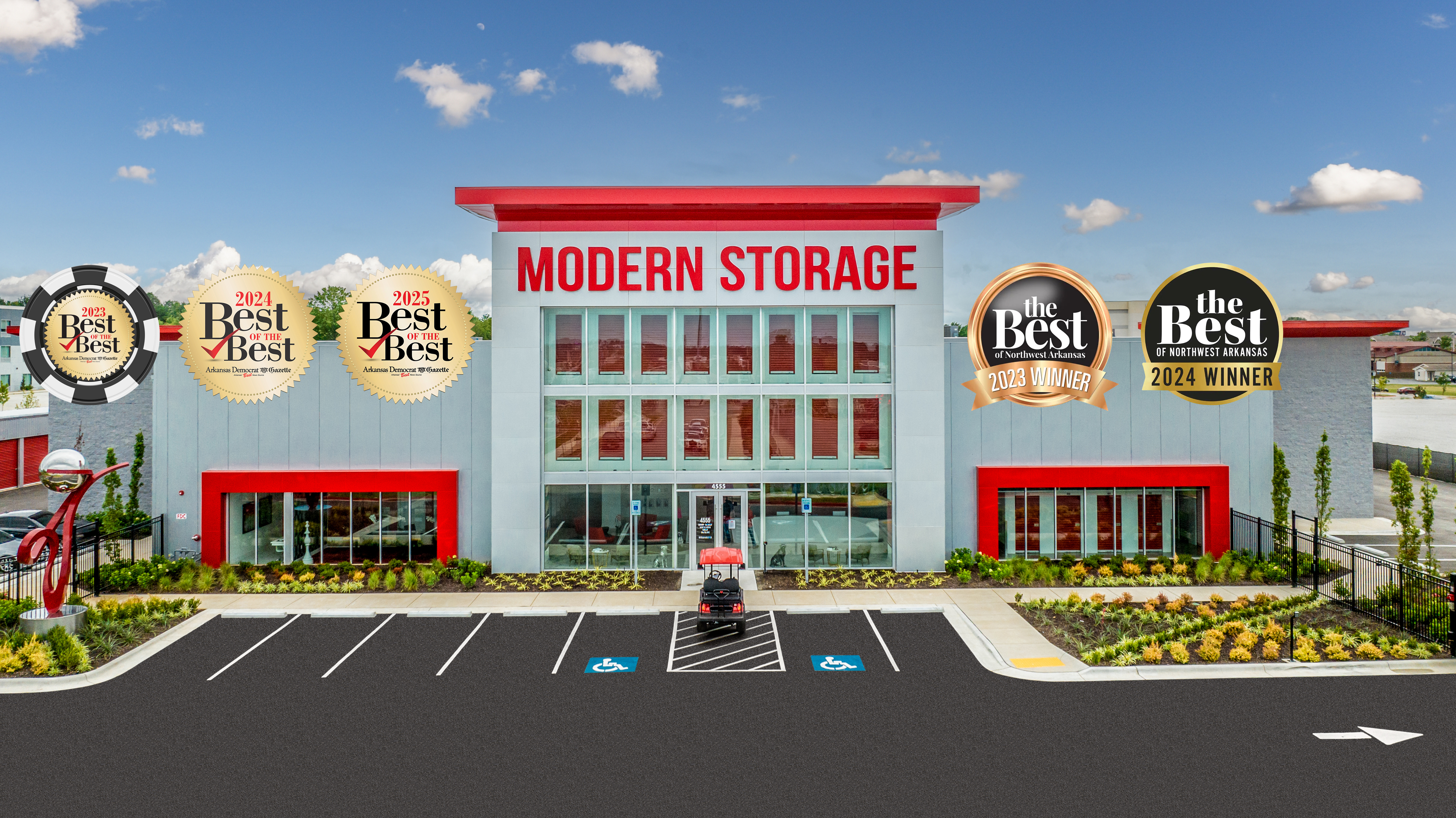 Exterior of a Modern Storage® facility featuring “Best of the Best” and “The Best of Northwest Arkansas” award badges